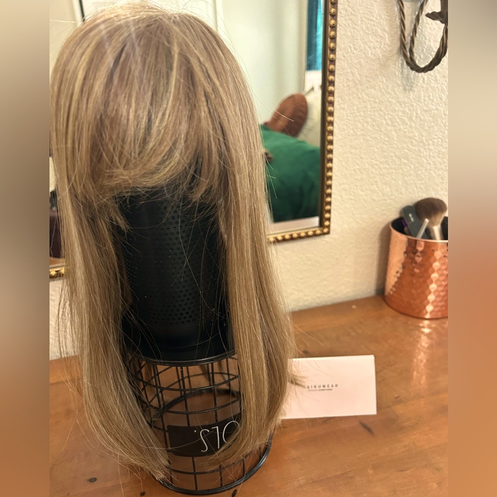 Top billing Hair topper Raquel Welch